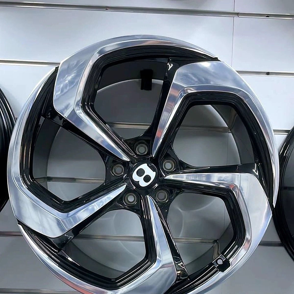 Bentley five-spoke chrome and black wheel